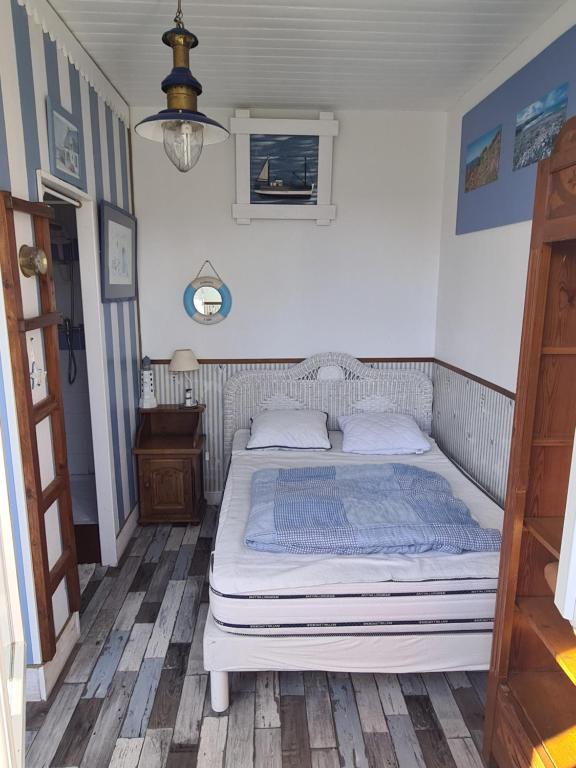 Postel nebo postele na pokoji v ubytování La Chaloupe Chambres d'hotes