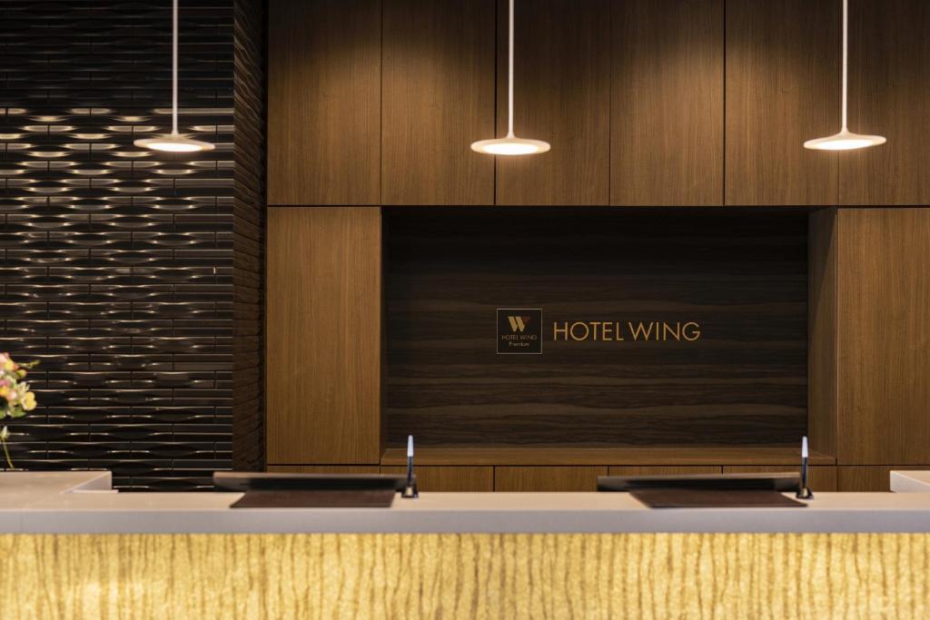 Um certificado, prêmio, placa ou outro documento exibido em Hotel Wing International Premium Osaka-Shinsekai