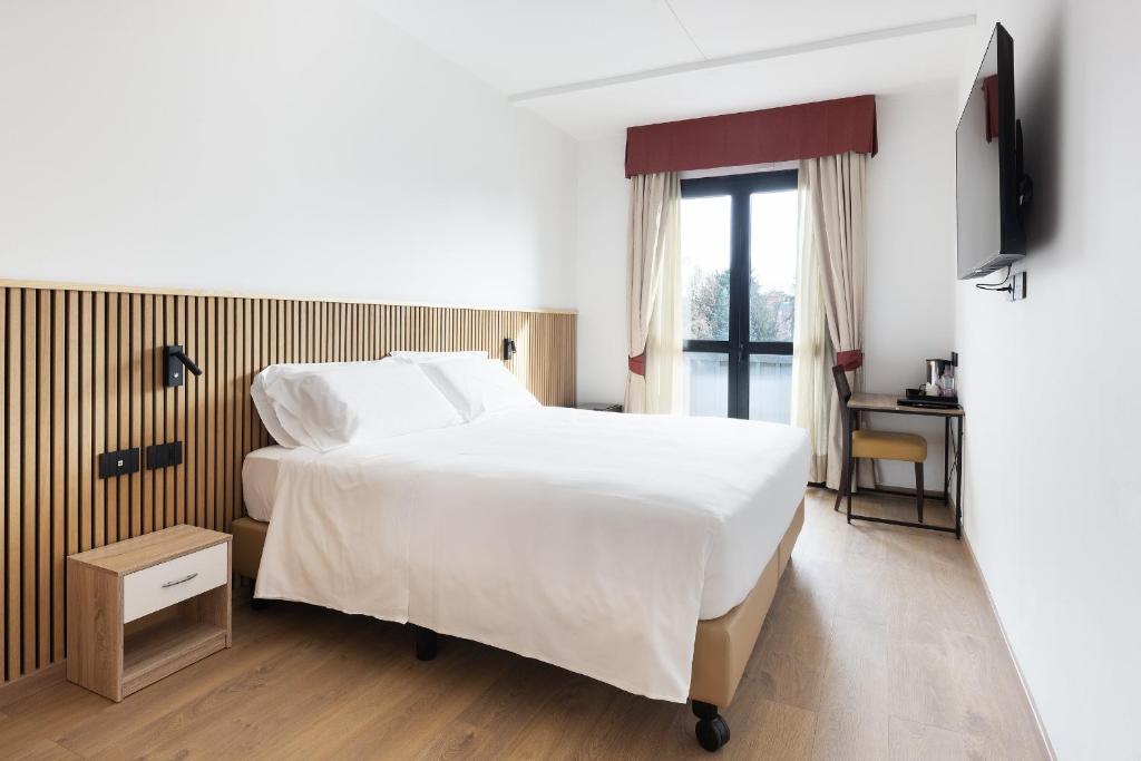 Postel nebo postele na pokoji v ubytování Moon Palace Hotel