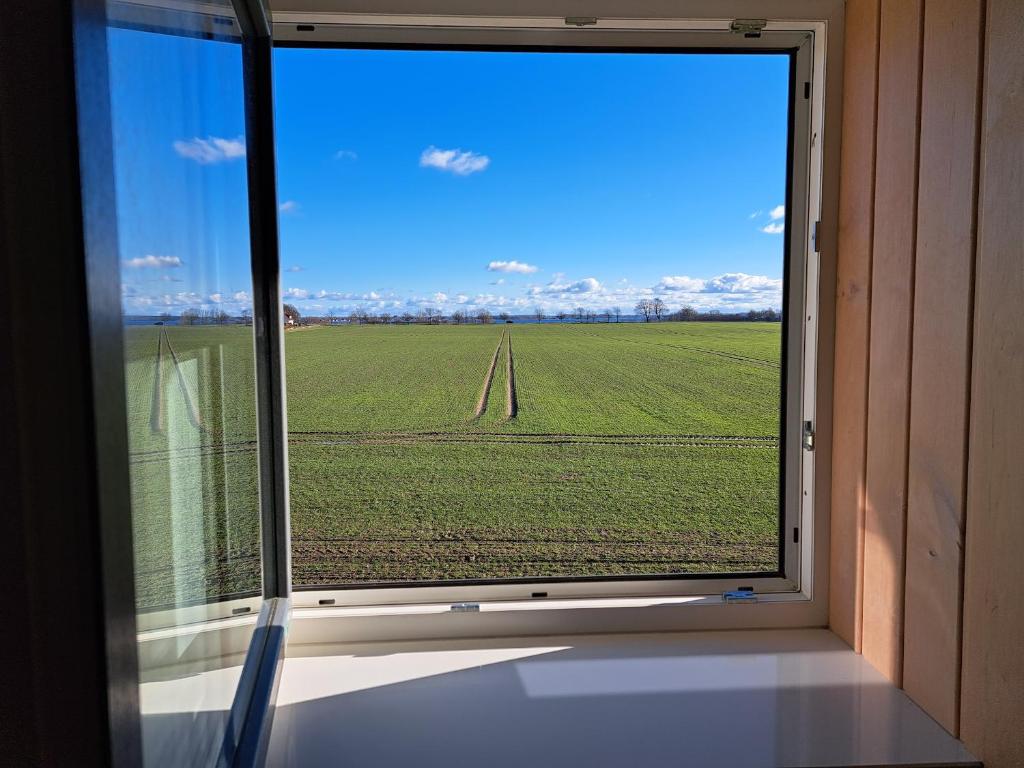 Fotografie z fotogalerie ubytování Ferienhaus Distelfink mit Sauna und Kamin v destinaci Dranske