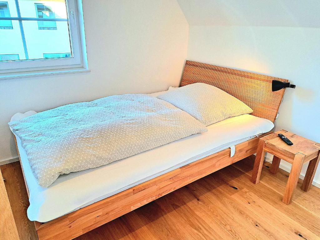 Postel nebo postele na pokoji v ubytování Ferienhaus Distelfink mit Sauna und Kamin