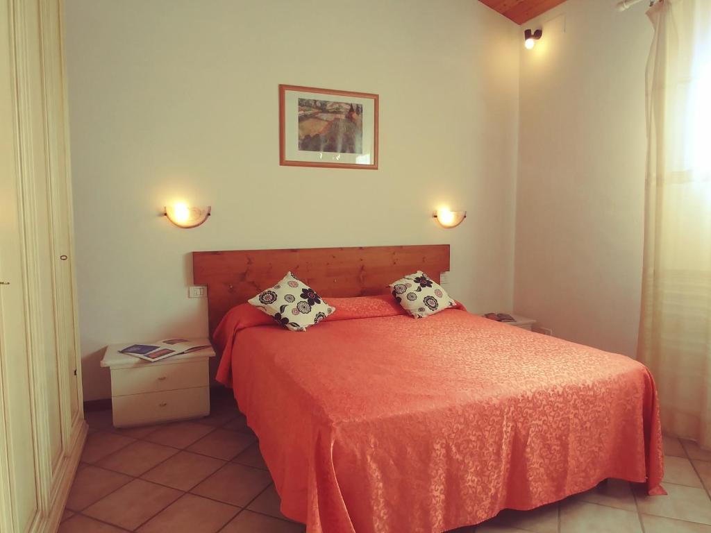 Posteľ alebo postele v izbe v ubytovaní Agriturismo Botro