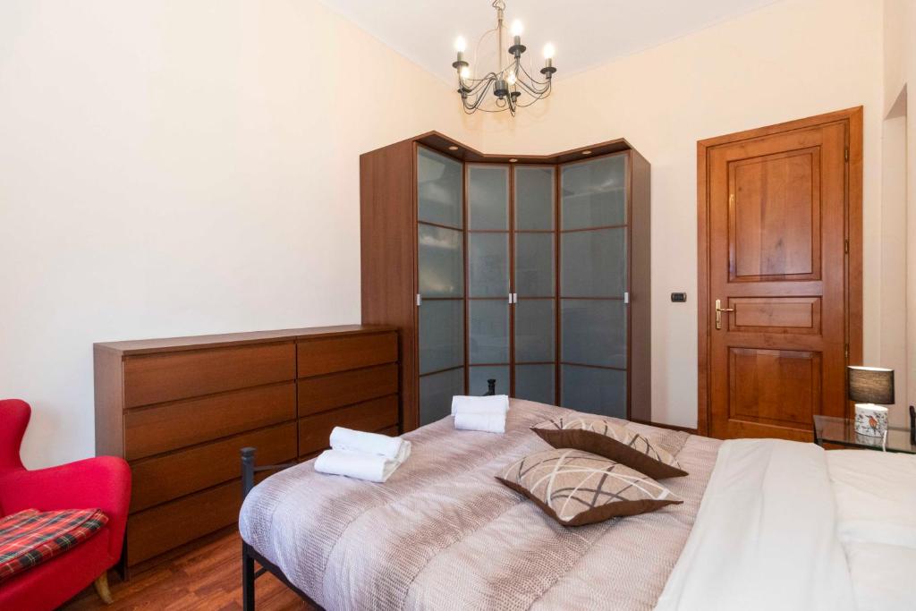 Letto o letti in una camera di Piazza Statuto Comfy APT - with 2 Balconies
