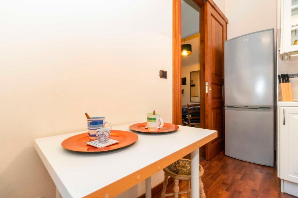 Cucina o angolo cottura di Piazza Statuto Comfy APT - with 2 Balconies
