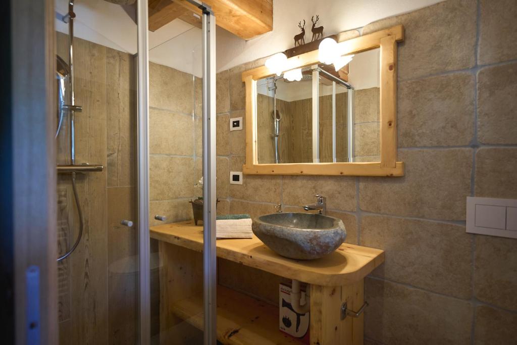 Koupelna v ubytování Natural Lodge Maso Baseta