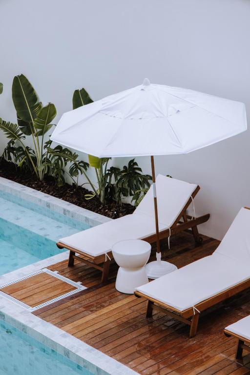 A piscina localizada em Olisa Hotel Boutique ou nos arredores