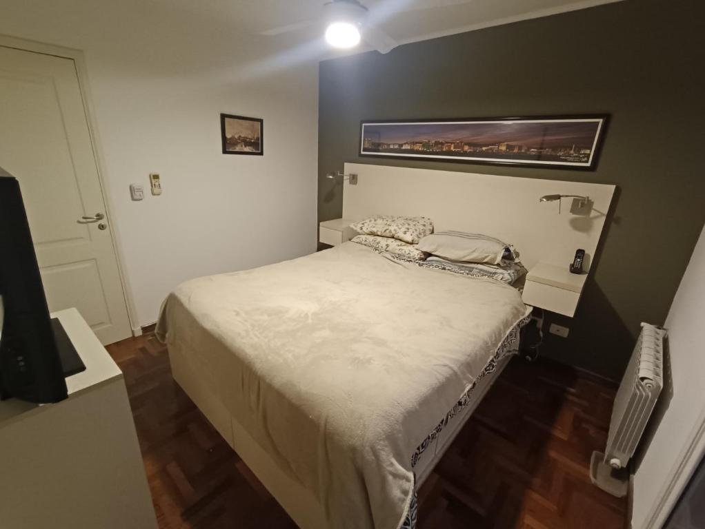 En eller flere senge i et værelse på ERA Residential Apartament