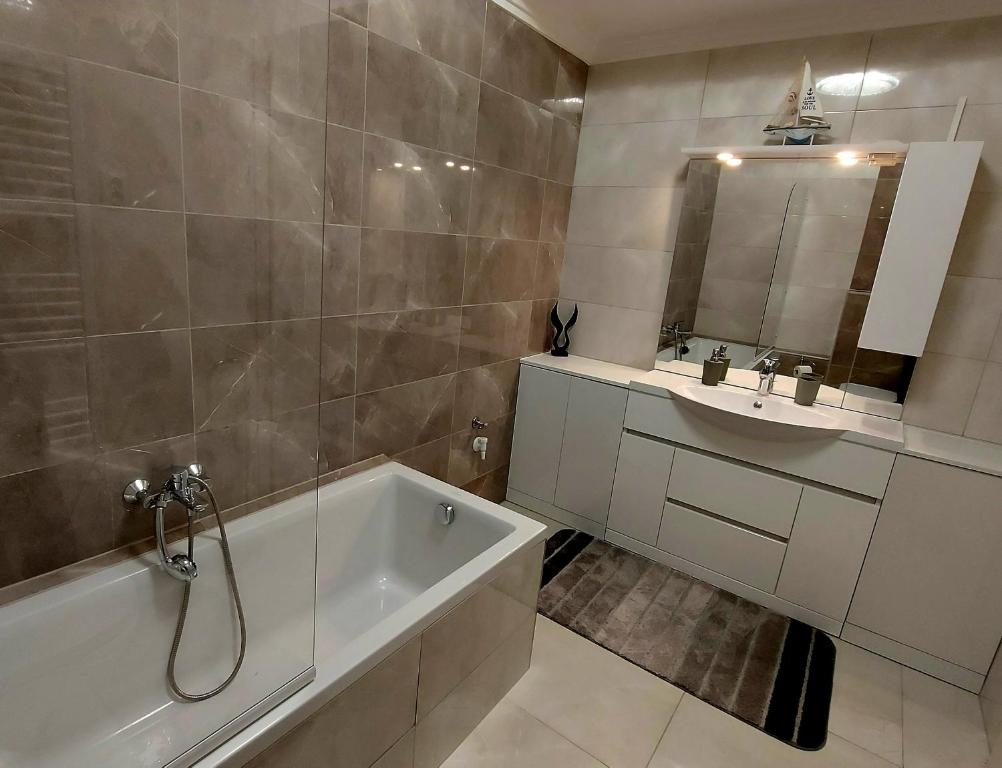 Kúpeľňa v ubytovaní Kikötő Sétány Apartman I.