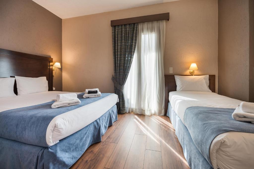 Arahova Inn Hotel - Habitación Triple