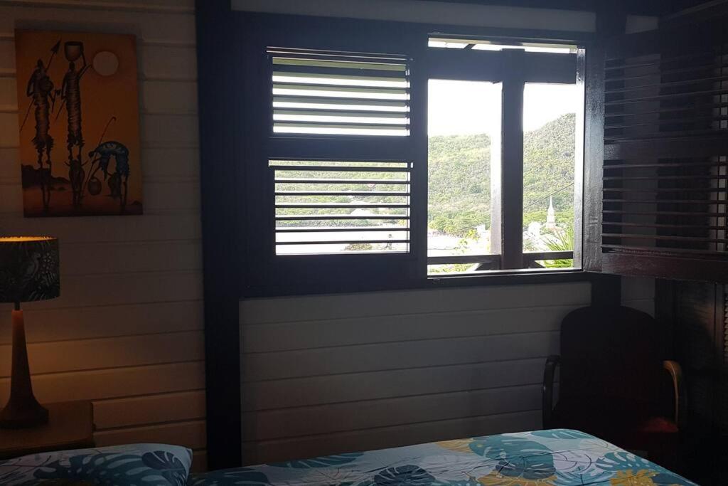 Postel nebo postele na pokoji v ubytování VILLA COCO ROSE