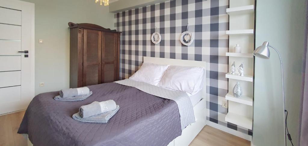 Posteľ alebo postele v izbe v ubytovaní Holiday Home SLAVIA NEW 408 z sypialnią i balkonem przy plaży