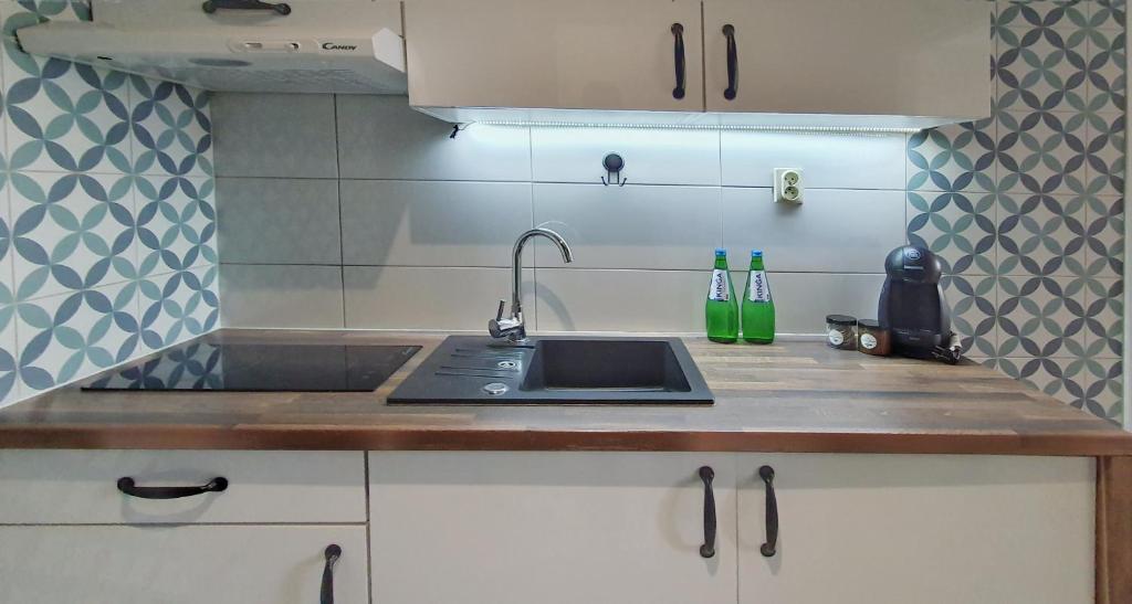 Kuchyňa alebo kuchynka v ubytovaní Holiday Home SLAVIA NEW 408 z sypialnią i balkonem przy plaży