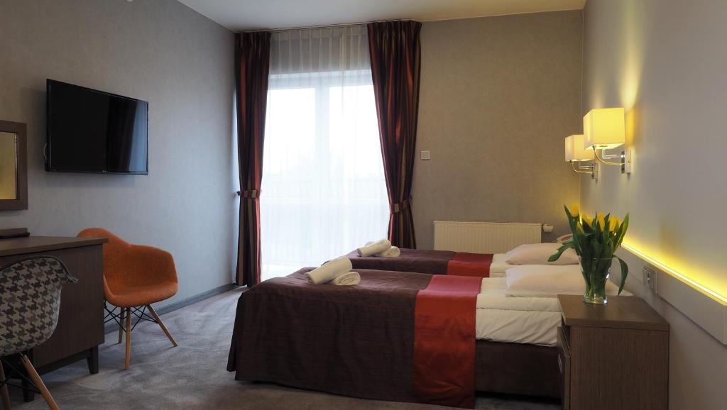 Telewizja i/lub zestaw kina domowego w obiekcie Hotel Konstancja