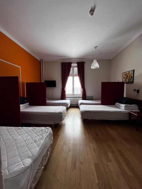 Postel nebo postele na pokoji v ubytování Carlstad Sport Hostel