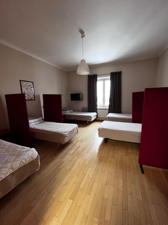 Postel nebo postele na pokoji v ubytování Carlstad Sport Hostel