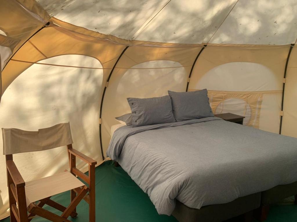 Postel nebo postele na pokoji v ubytování Glamping Remanso del Espíritu