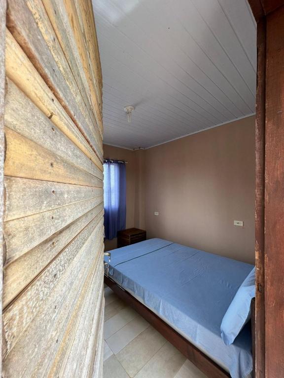 Postel nebo postele na pokoji v ubytování Pousada Canela de Ema