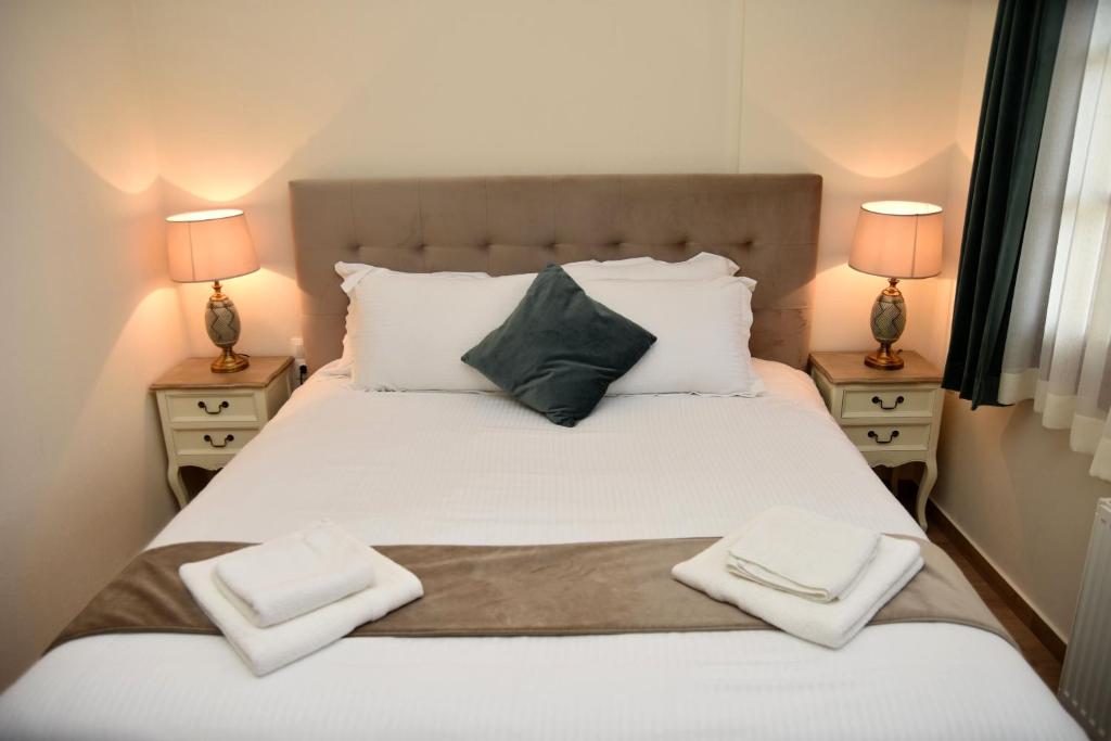 Postel nebo postele na pokoji v ubytování NUCA GUESTHOUSE