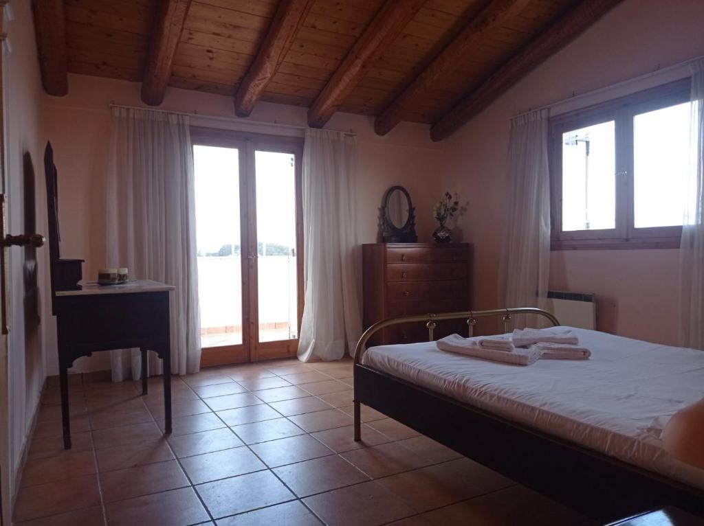 A bed or beds in a room at Palazzo con Vista