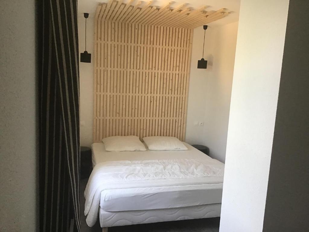 Postel nebo postele na pokoji v ubytování Domaine Chamarel