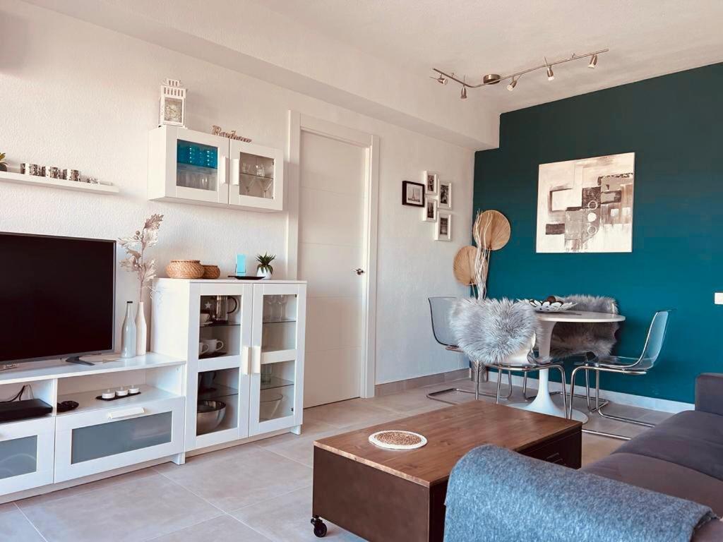 A television and/or entertainment centre at Fantastic apartment sea view near Puerto Banus