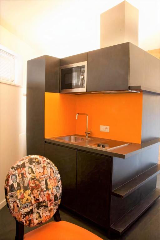 Kuchyň nebo kuchyňský kout v ubytování Hotel L'Esprit Sain