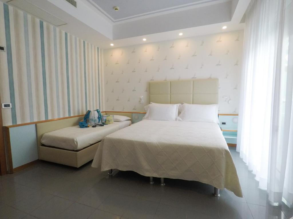 Postel nebo postele na pokoji v ubytování Hotel Gaby
