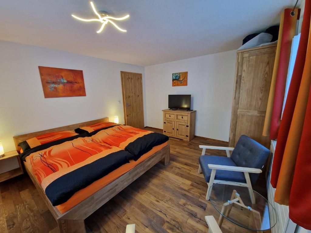 Postel nebo postele na pokoji v ubytování Chalet-Daheim-Fiesch 3,5-Zimmerwohnung