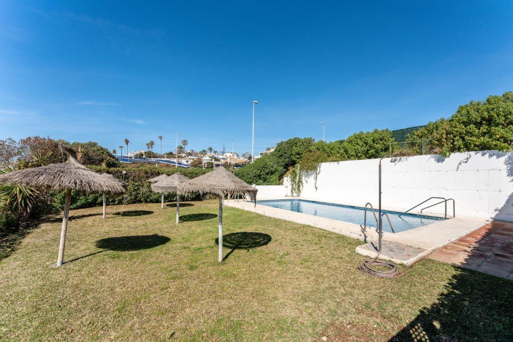 Bazén v ubytovaní Oasis la Cala alebo v jeho blízkosti