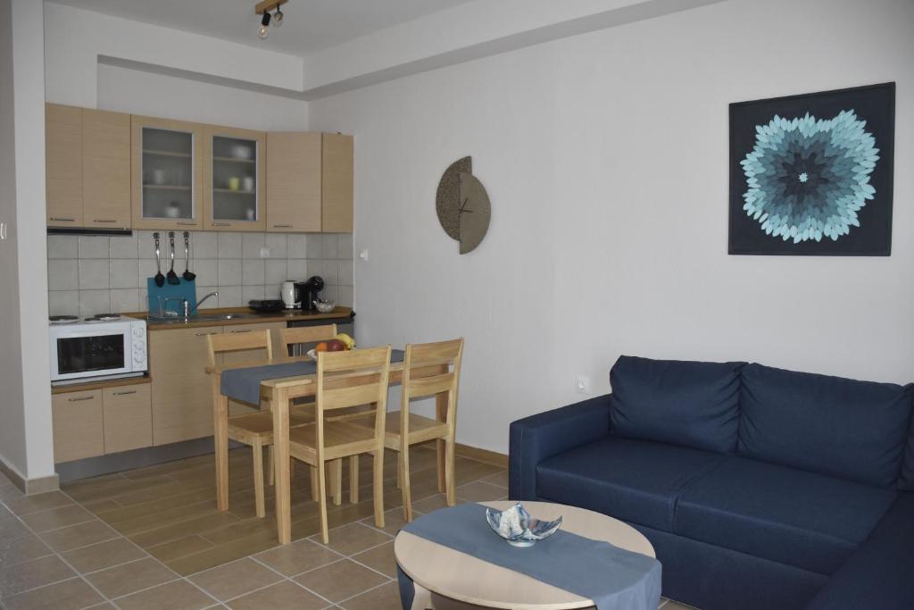 A kitchen or kitchenette at ARELIA APARTMENTS IERISSOS