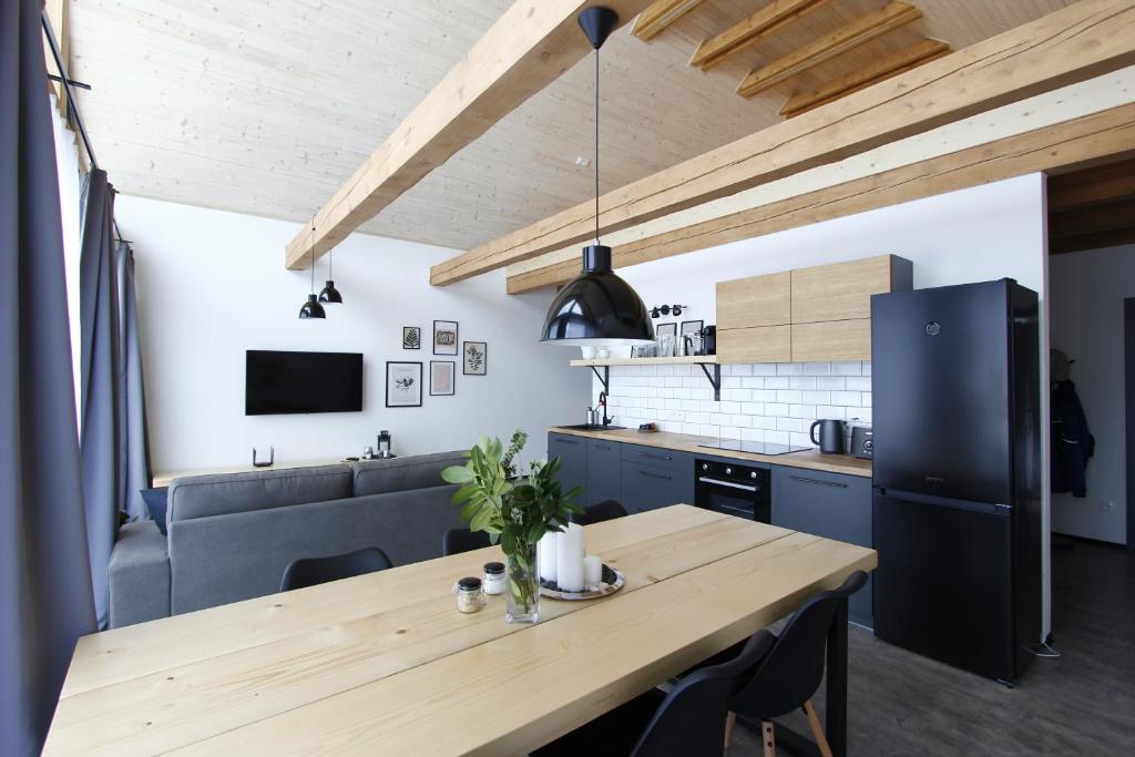 Kuchyň nebo kuchyňský kout v ubytování Apartmány Na Smrčku