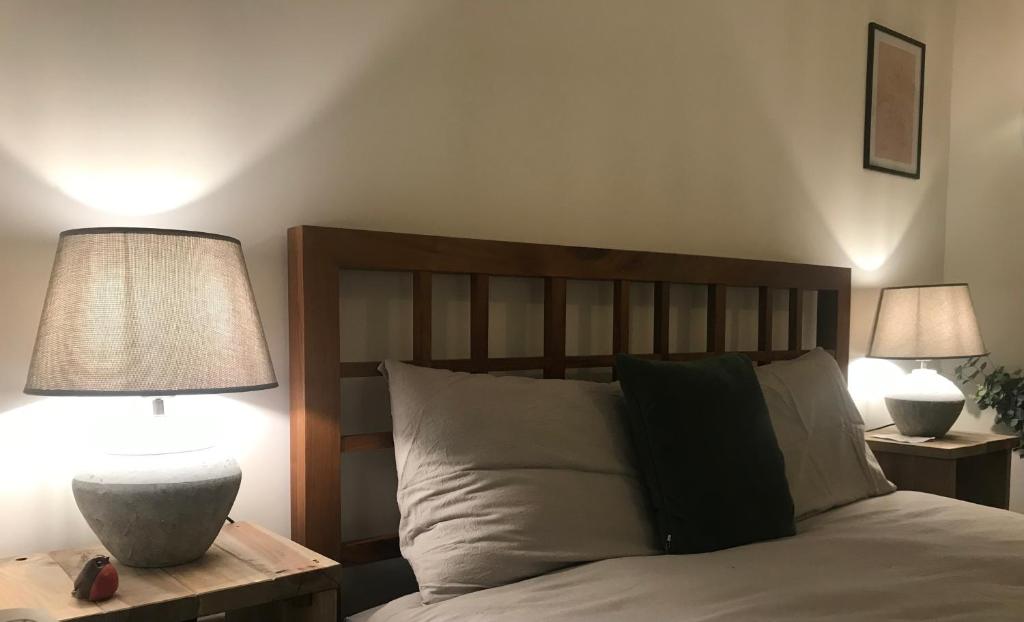 Ένα ή περισσότερα κρεβάτια σε δωμάτιο στο Dromdiah Lodge