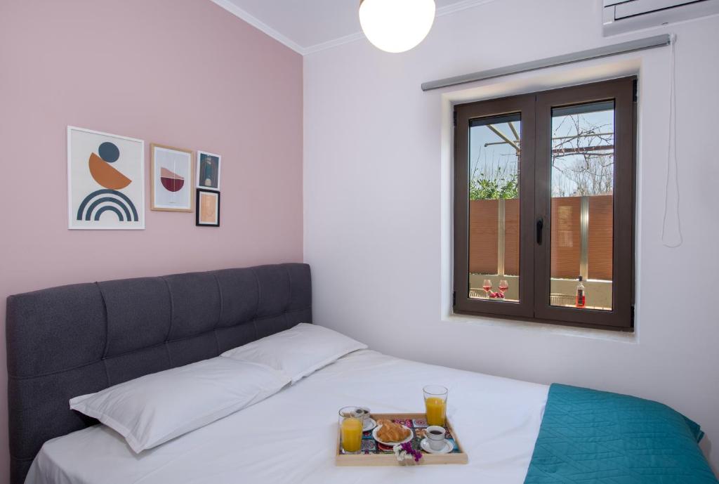 Posteľ alebo postele v izbe v ubytovaní Anastasia & Maria Luxury Residence