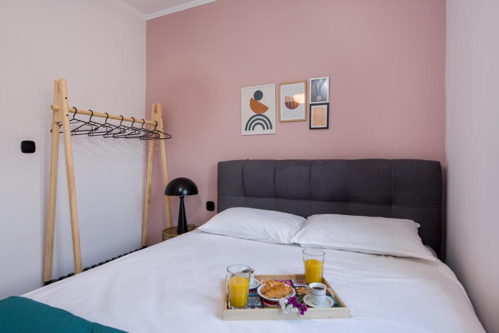 Posteľ alebo postele v izbe v ubytovaní Anastasia & Maria Luxury Residence