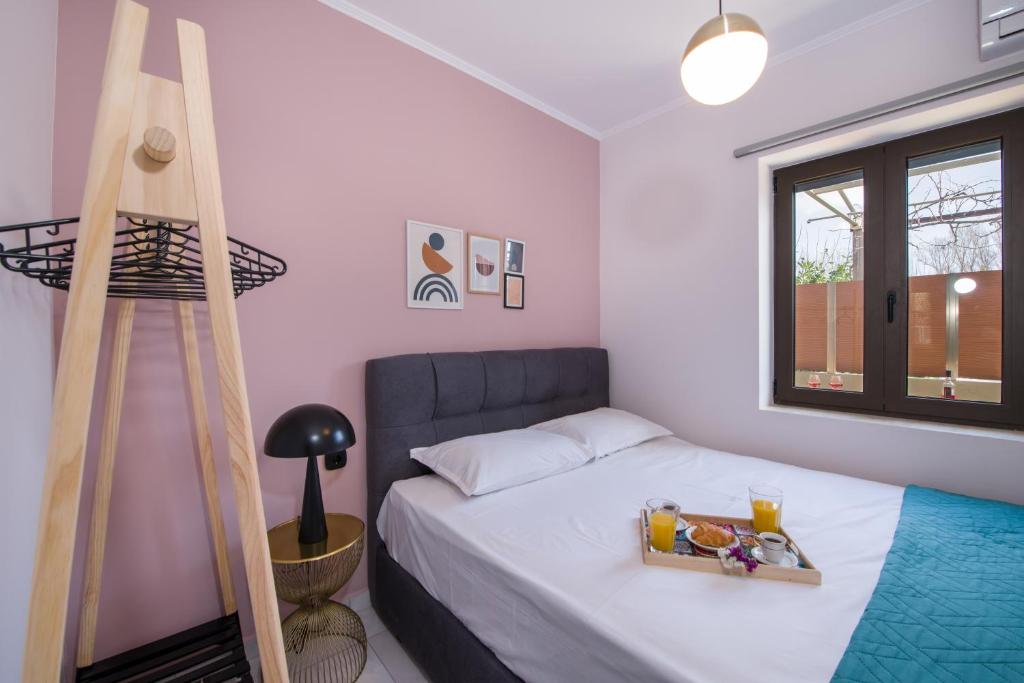 Posteľ alebo postele v izbe v ubytovaní Anastasia & Maria Luxury Residence
