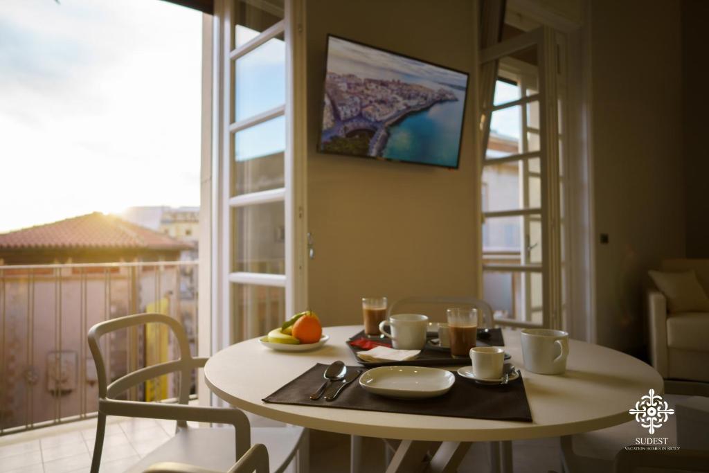 TV a/nebo společenská místnost v ubytování Matteotti Luxury Residence