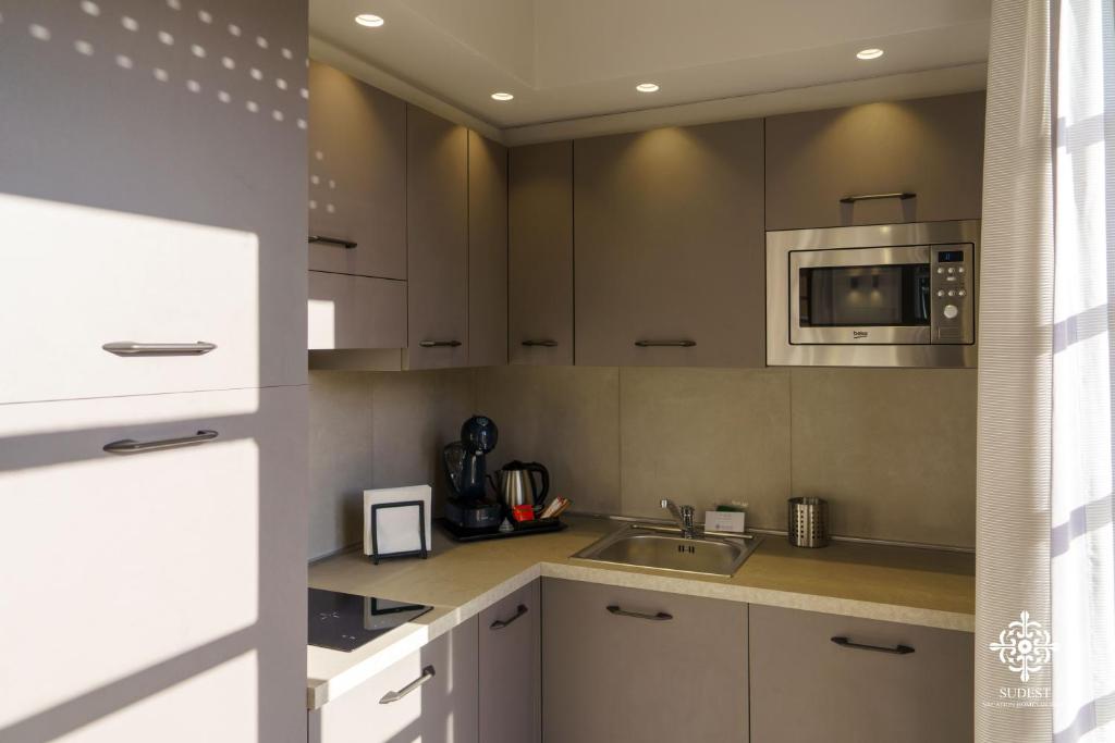Kuchyň nebo kuchyňský kout v ubytování Matteotti Luxury Residence