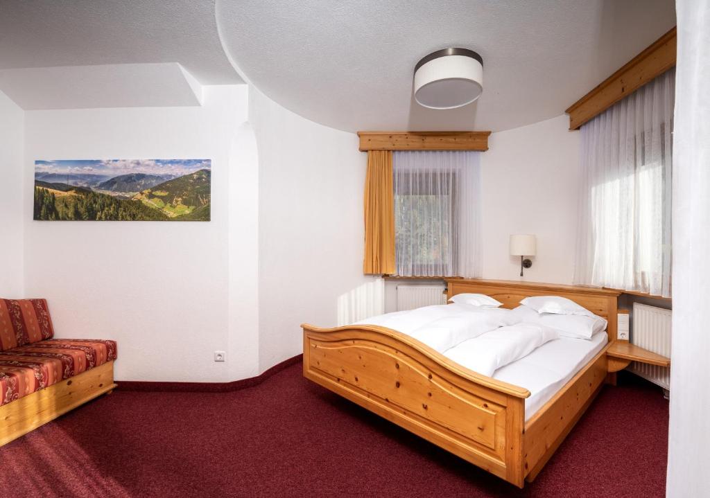 Postel nebo postele na pokoji v ubytování Aparthotel Panorama