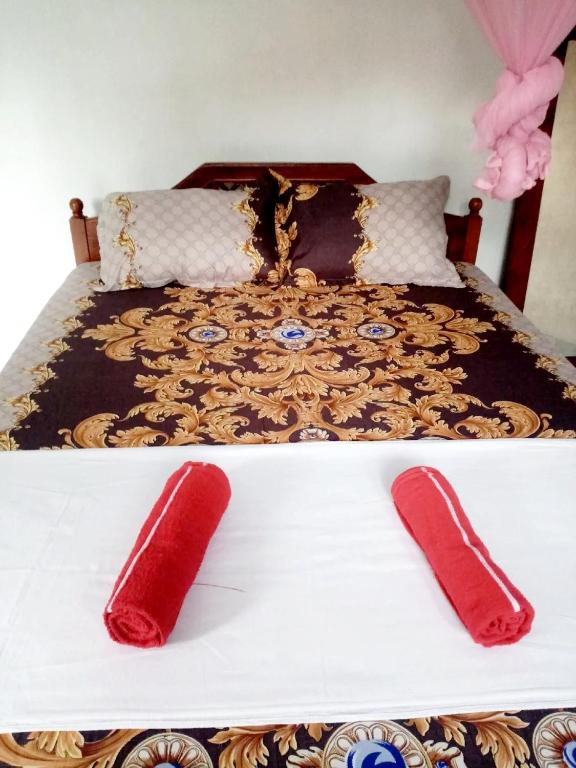Postel nebo postele na pokoji v ubytování Chandi Mahal HomeStay