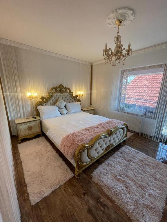 Postel nebo postele na pokoji v ubytování Negrean Residence