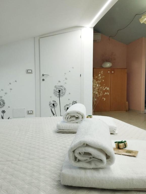 Postel nebo postele na pokoji v ubytování Ferula loft