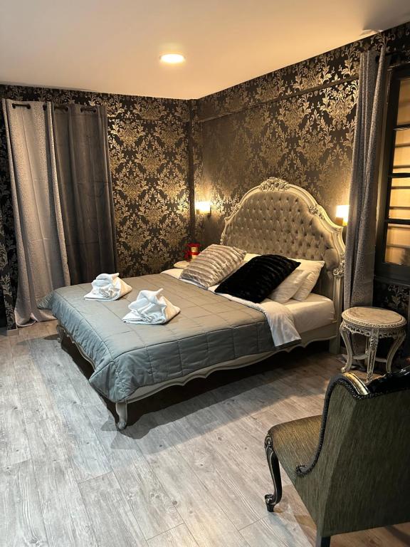 Posteľ alebo postele v izbe v ubytovaní ROH Suites
