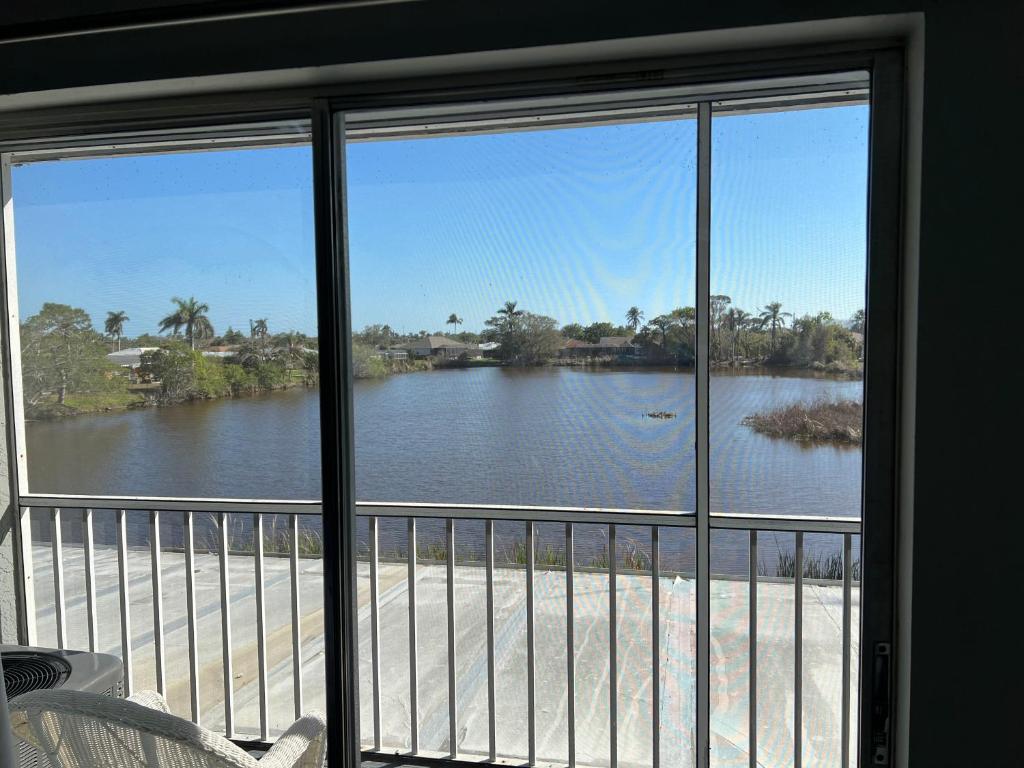 a view of a body of water from a window at Marco Island Lakeside Inn in Marco Island