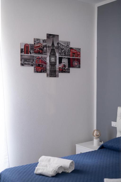 Postel nebo postele na pokoji v ubytování Le Stelle Della Spezia