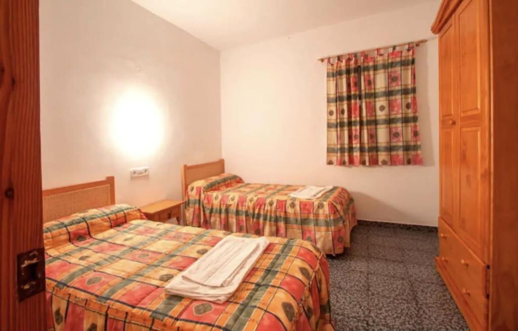 Postel nebo postele na pokoji v ubytování Villa MORELL