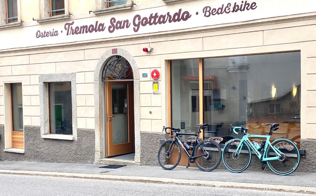 a group of bikes parked outside of a store at Bed&Bike Tremola San Gottardo in Airolo