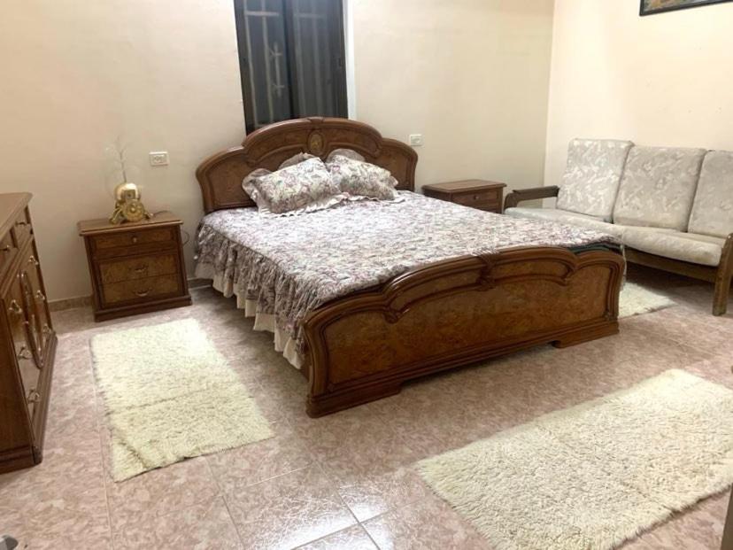 A bed or beds in a room at Bayt Ateeq 2 Bethlehem بيت دار عتيق