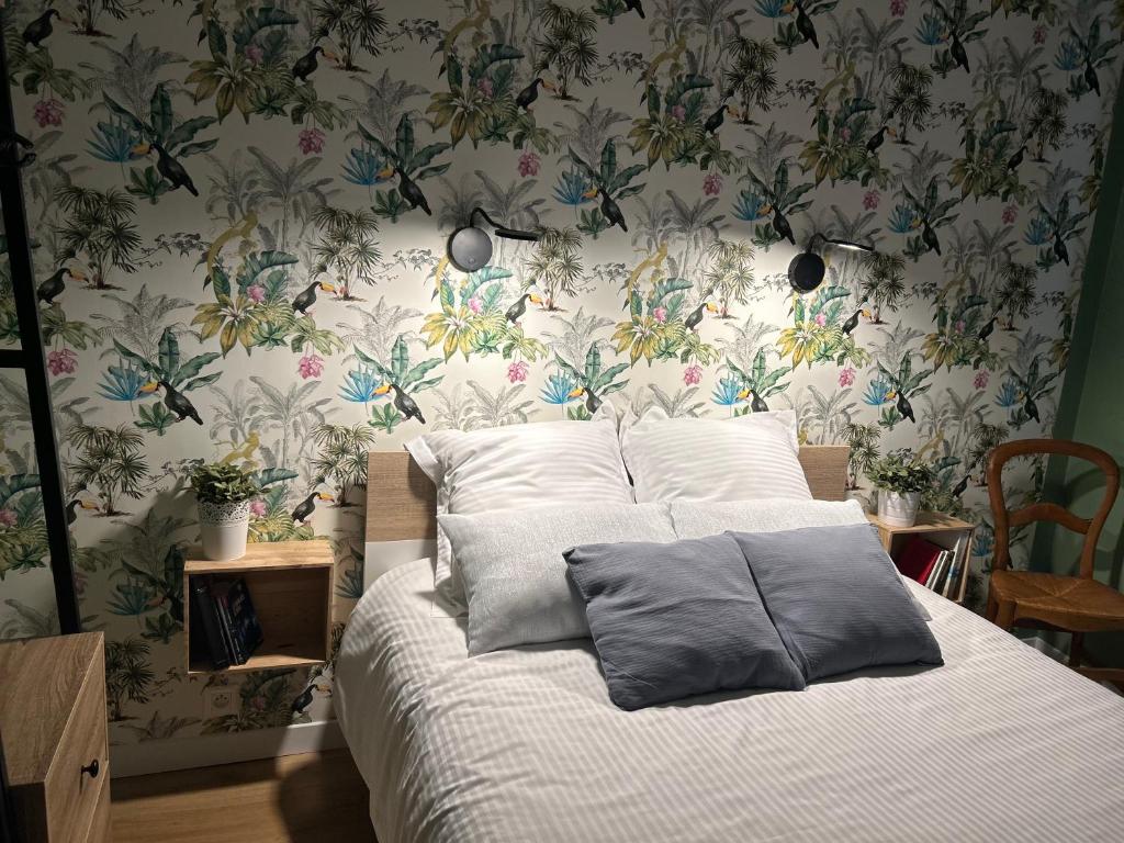 Posteľ alebo postele v izbe v ubytovaní Magnifique Appartement l'Aigrette