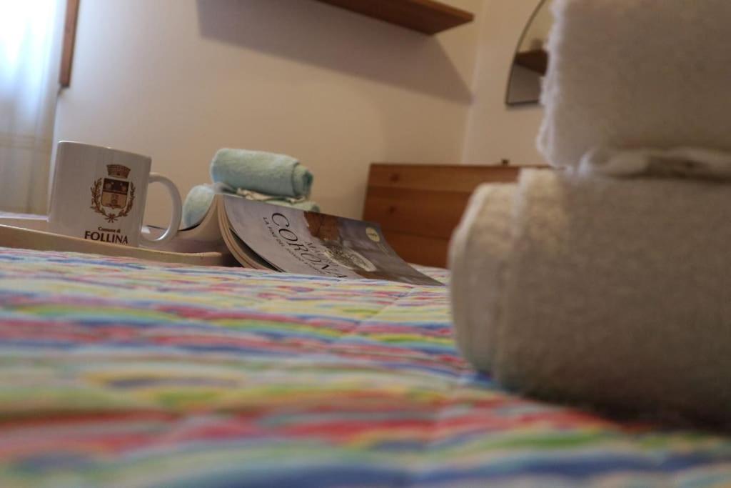 a bedroom with a bed with a skateboard on it at Casa Angela a Follina in Follina