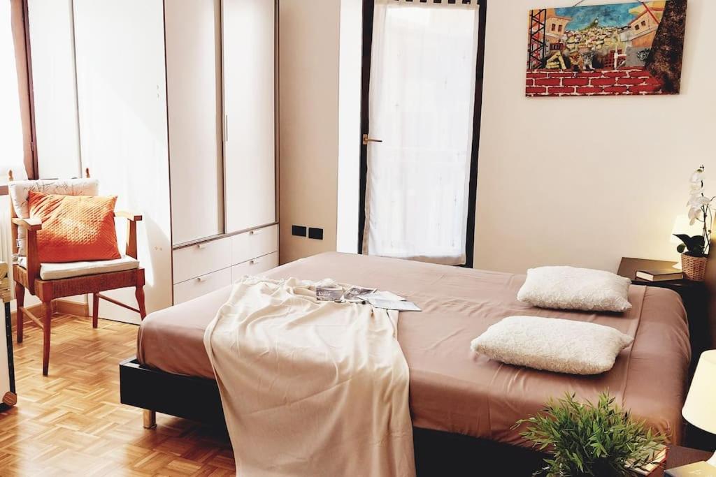 En eller flere senge i et værelse på Arco Felix